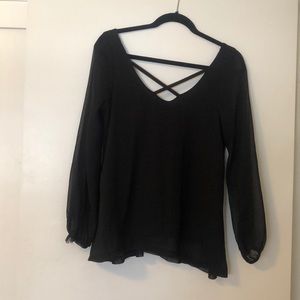 Women’s black sheer blouse with criss cross